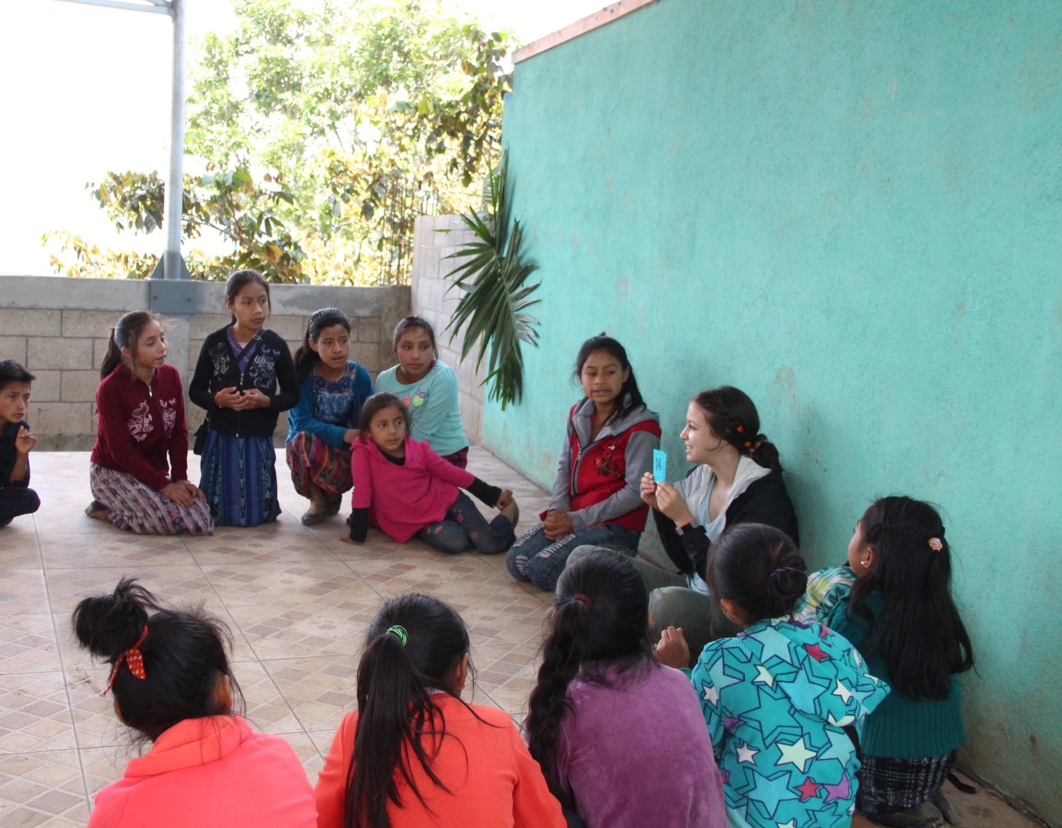 Student teaching kids in Guatemala